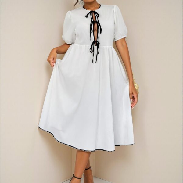 Elegant Black and White Color Block Puff Sleeve A-Line Midi Dress with Bowknot Detail for Various Occasions – Chic, Classy, and Trendy Fashion Style to Dress to Impress