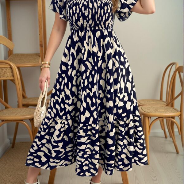 Elegant Navy Blue Flattering Puff Sleeve A-Line Midi Dress with Ruffle Hem and High Waist for Stylish Spring and Summer Looks - Chic, Classy and Trendy Fashion Style to Dress to Impress