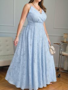 Elegant Blue V-Neck Dress with Alluring Collar Bone Exposure, Feminine 3D Daisy Cutout Design, Flattering High-Waisted Fit for Special Occasions, Perfectly Styled with High Heels and Minimal Jewelry for a Trendy Look to Shine in Every Event